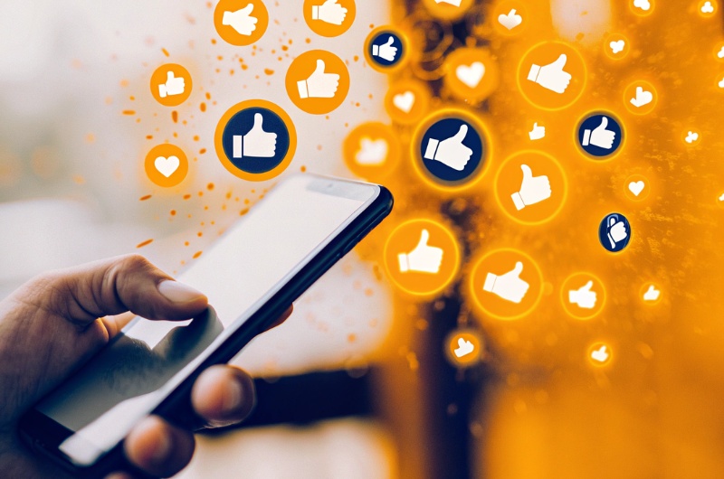 Icons exploding around a smartphone, symbolizing rapid content sharing