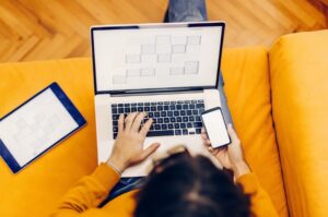 TWO DOTS young professional uses content distribution across multiple devices for digital marketing